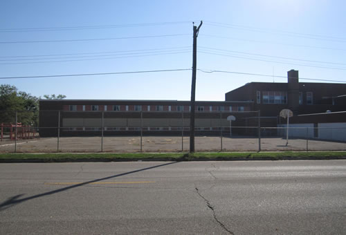 Large school building on 4 acres with 2 Gyms in Clarkfield, Minnesota. $109,000